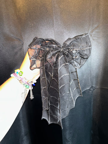 Spider mesh bow