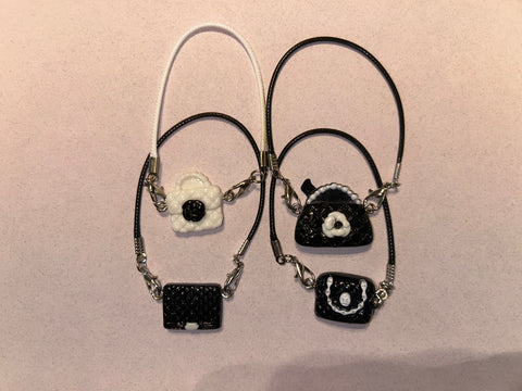 Mystery doll purse