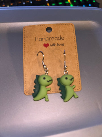 Green dinosaur earrings