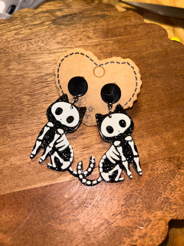 Skeleton cat earrings